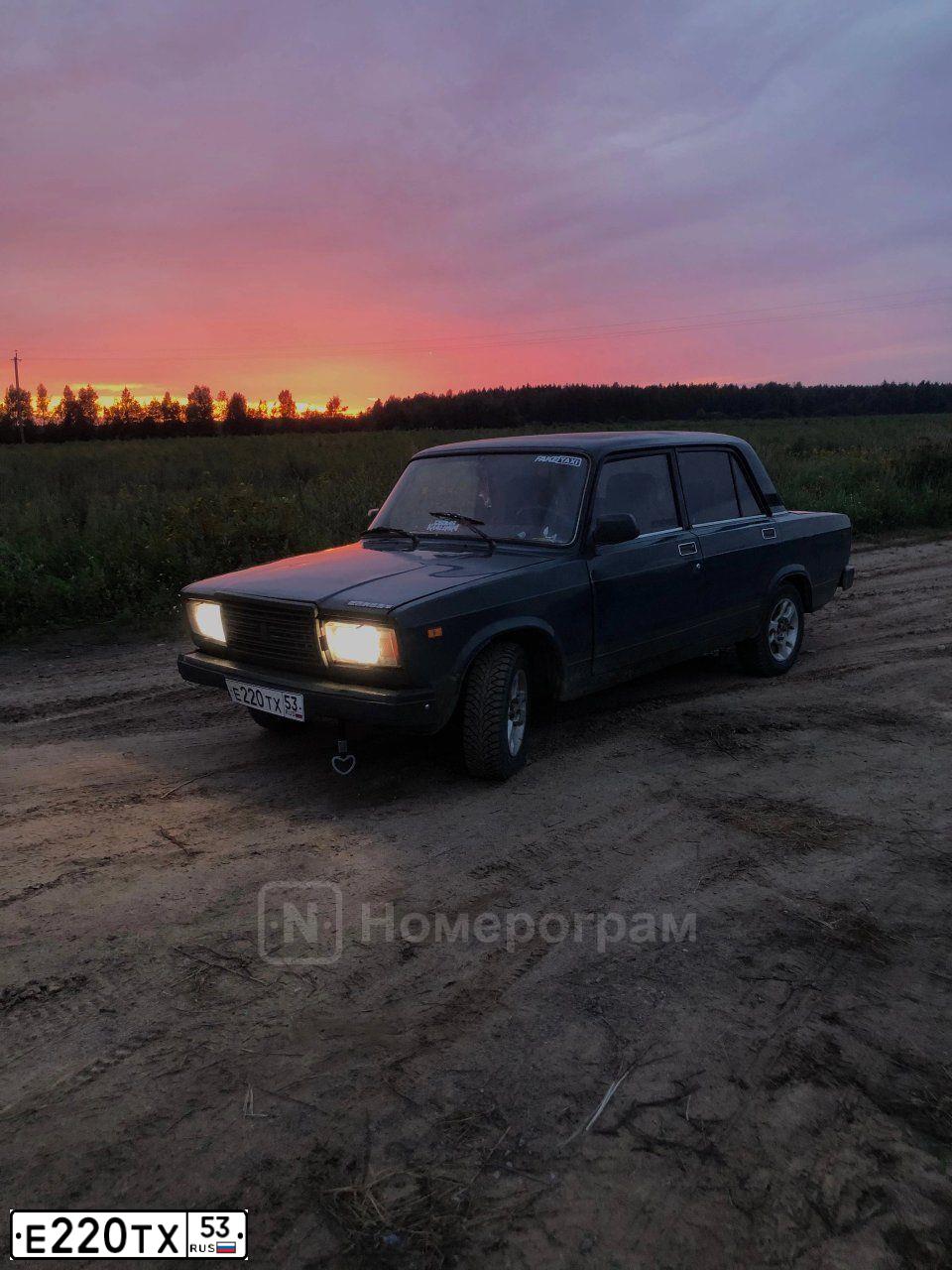 Фото автомобиля LADA 2107 LADA, 2004 — госномер Е220ТХ53. Цвет: сине-зеленый