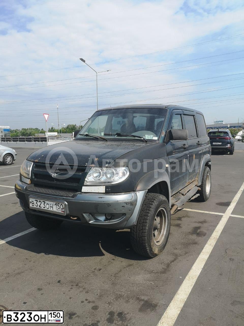 Фото автомобиля UAZ 3163 PATRIOT, 2007 — госномер В323ОН150. Цвет: МЕТАЛЛИК