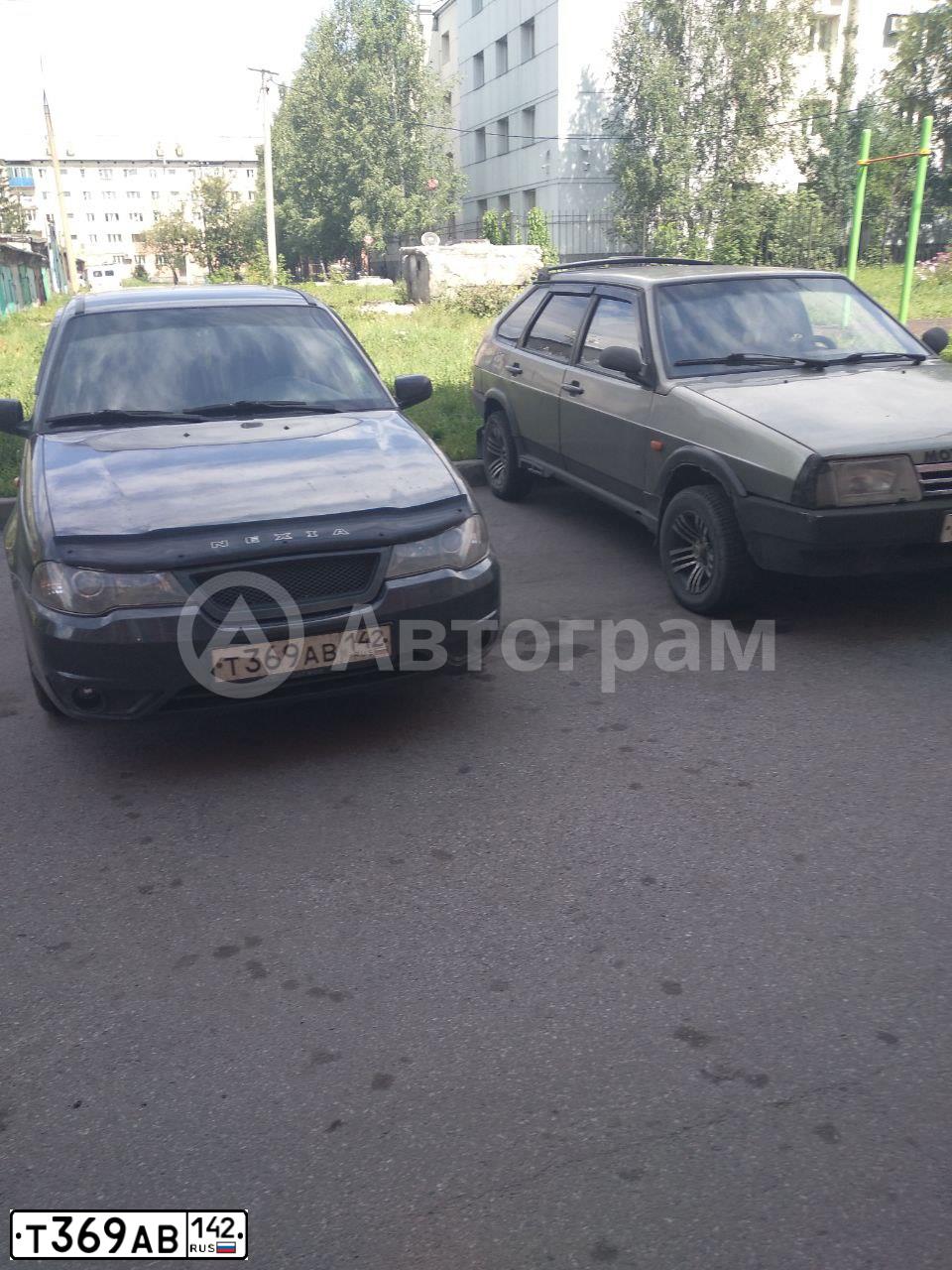 Фото автомобиля DAEWOO NEXIA, 2011 — госномер Т369АВ142. Цвет: Бледно-Черный