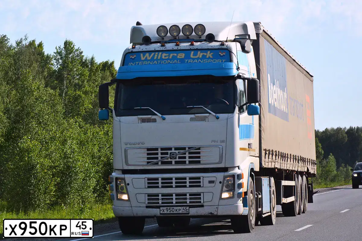 Фото автомобиля VOLVO FH12, 1996 — госномер Х448НМ138