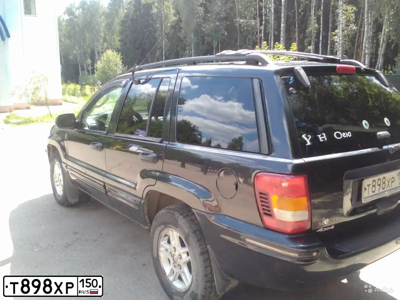 Фото автомобиля JEEP GRAND CHEROKEE, 2004 — госномер Т315ТА150. Цвет: ЧЕРНЫЙ