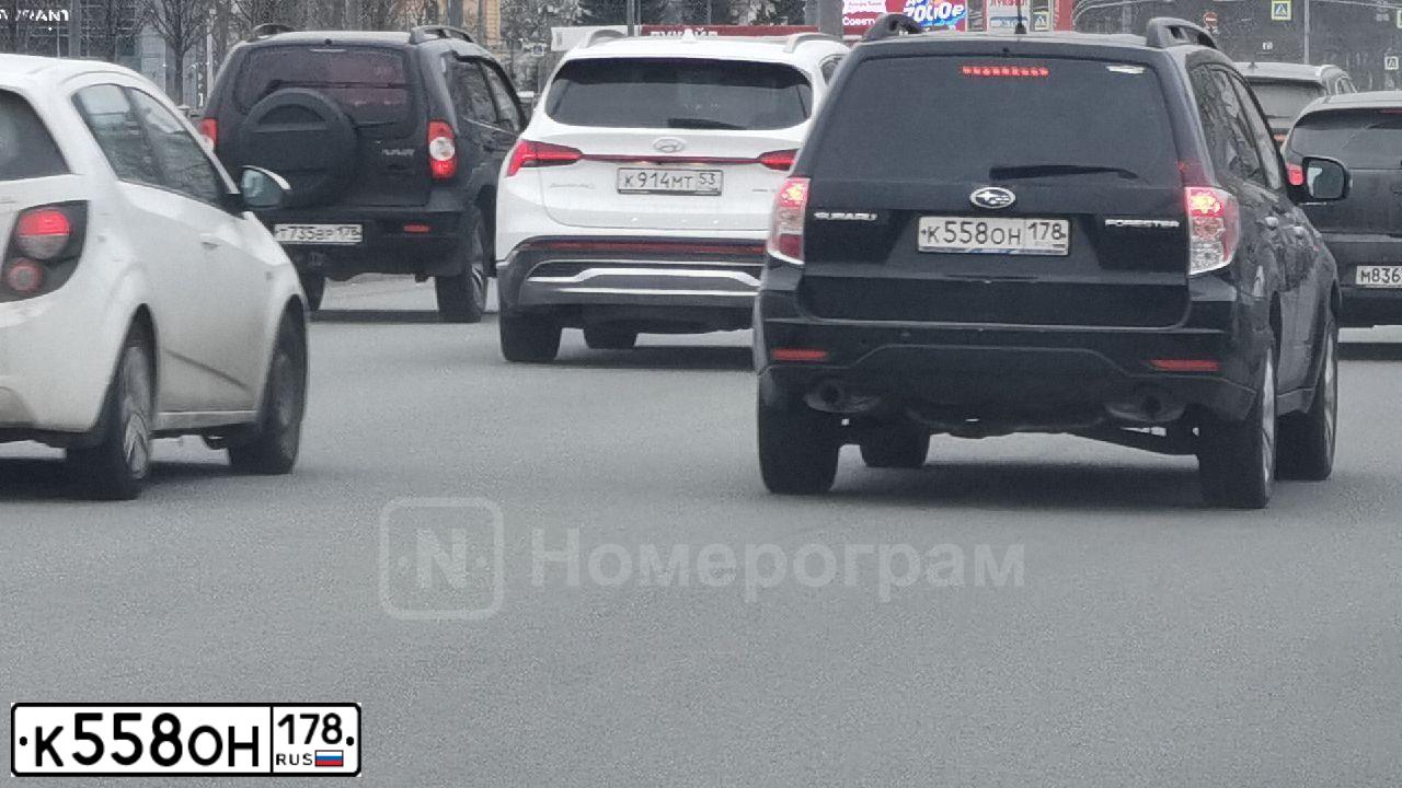 Фото автомобиля SUBARU FORESTER, 2011 — госномер К558ОН178. Цвет: ЧЕРНЫЙ