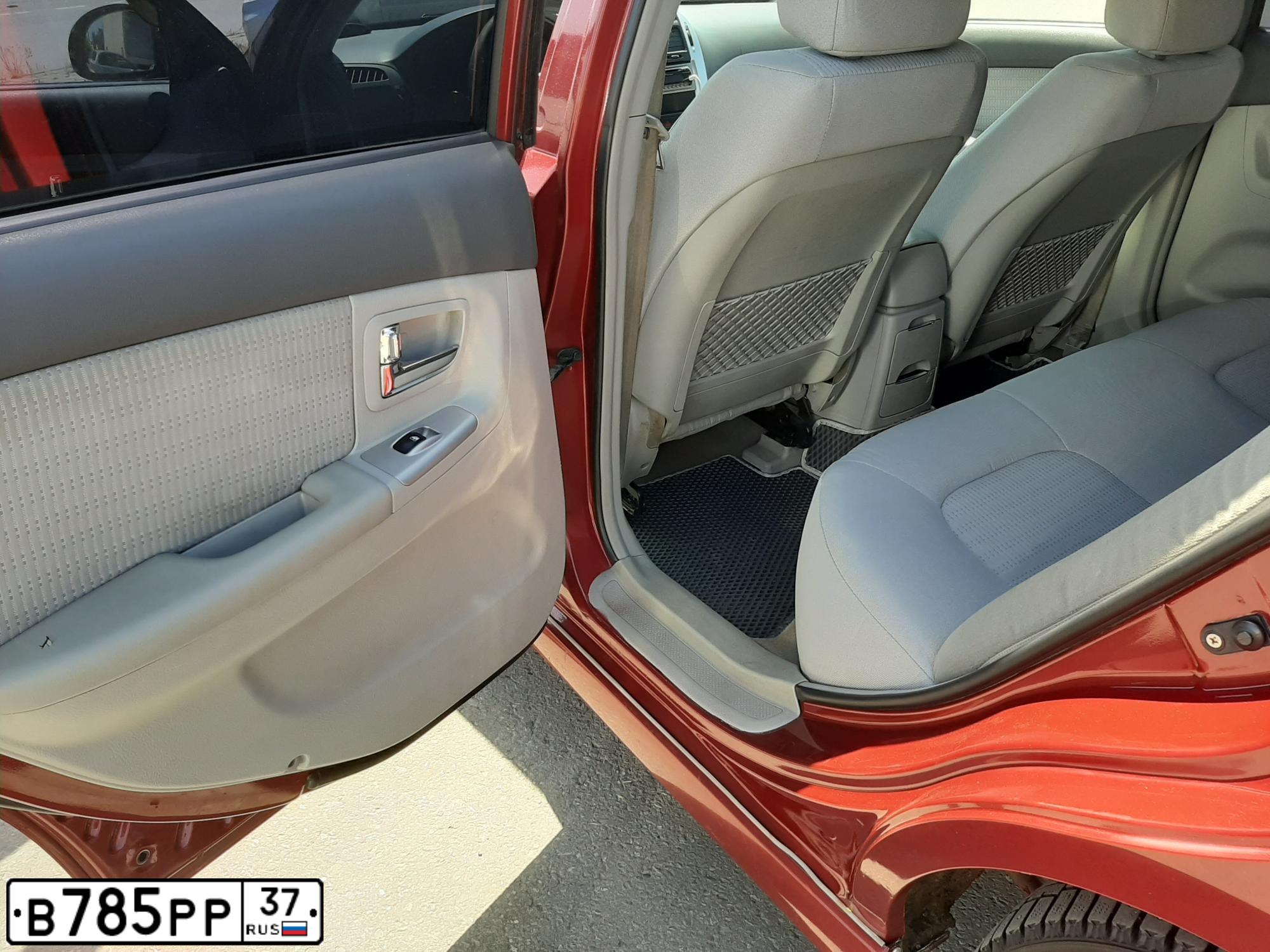 Фото автомобиля KIA CERATO, 2006 — госномер В785РР37. Цвет: Красный