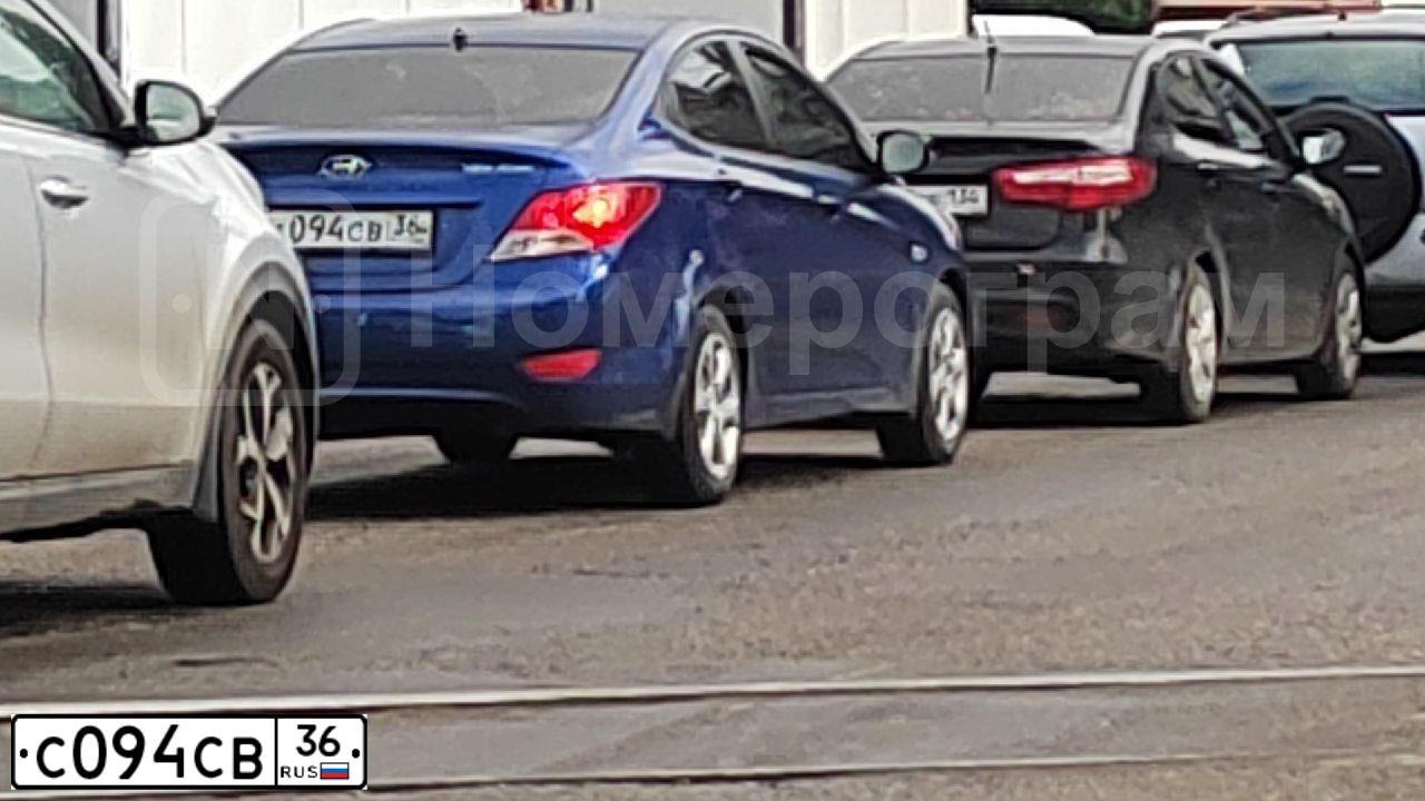 Фото автомобиля NISSAN MICRA, 2004 — госномер Т566ВР193. Цвет: Красный