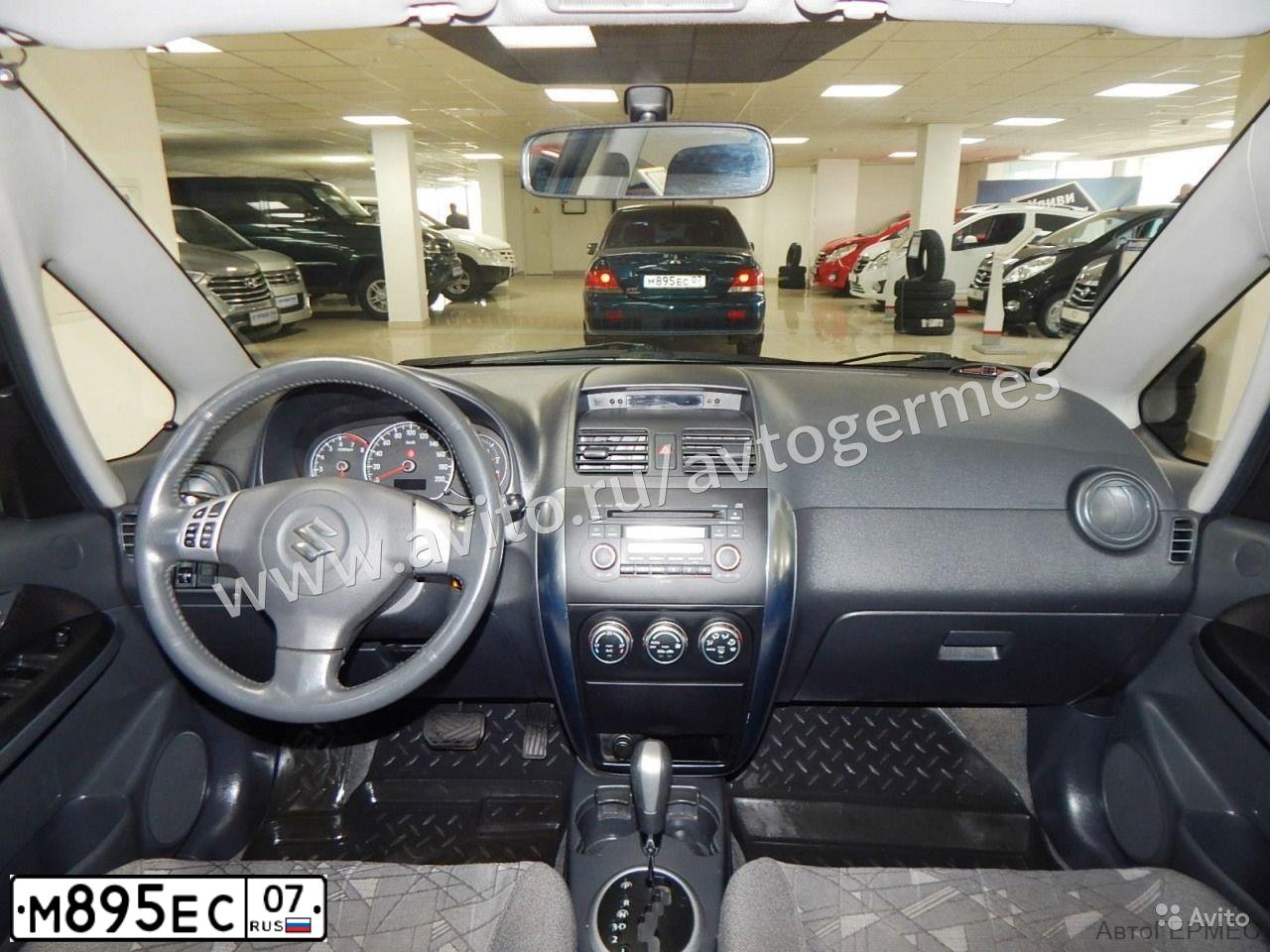 Фото автомобиля MITSUBISHI LANCER, 2005 — госномер Р549РВ05. Цвет: синий