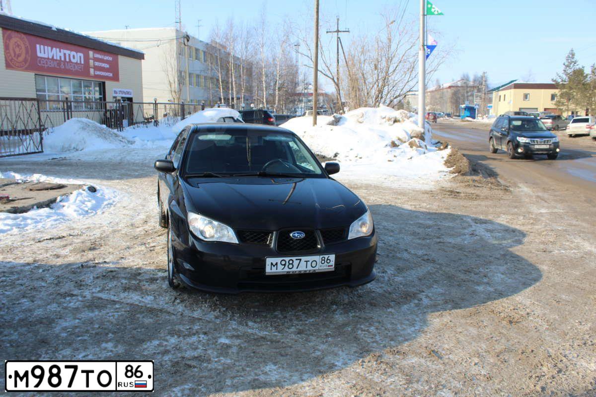 Фото автомобиля SUBARU IMPREZA, 2007 — госномер М987ТО86. Цвет: ЧЕРНЫЙ