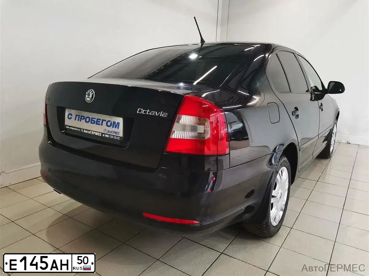 Фото автомобиля SKODA OCTAVIA, 2013 — госномер Н769СМ32. Цвет: ЧЕРНЫЙ