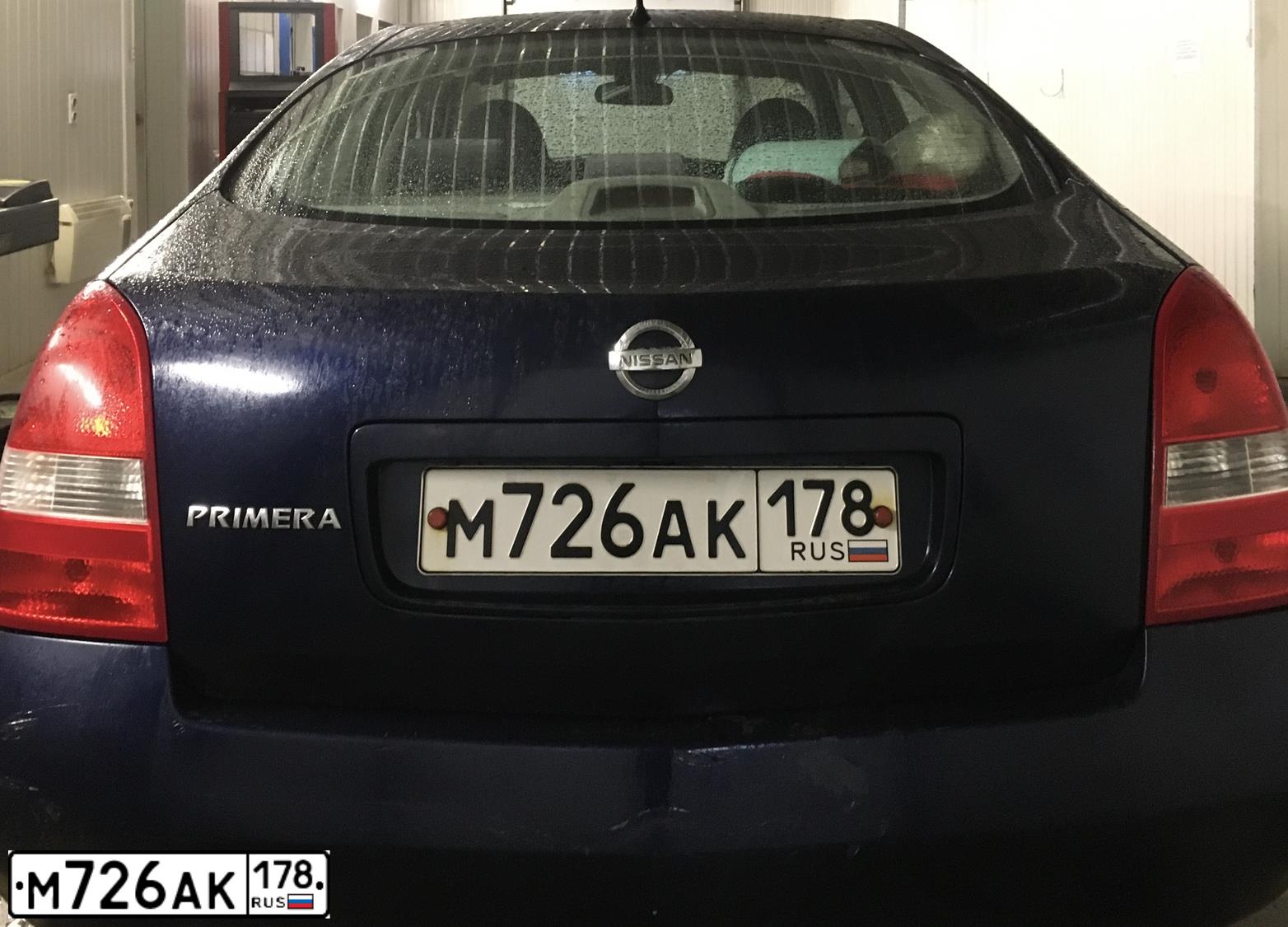 Фото автомобиля NISSAN PRIMERA, 2005 — госномер О158АС76. Цвет: синий