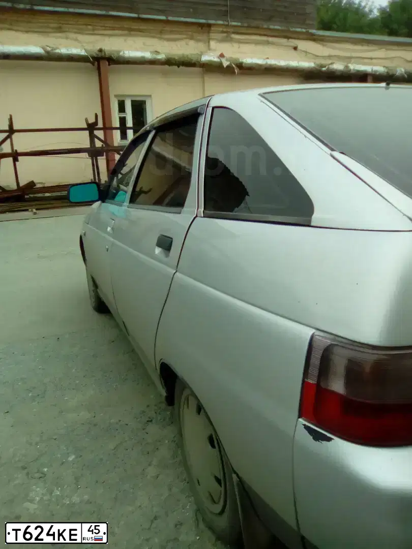Фото автомобиля LADA 2112 LADA, 2002 — госномер К022МВ45. Цвет: СВЕТЛО-СЕРЕБРИСТЫЙ МЕТАЛЛ