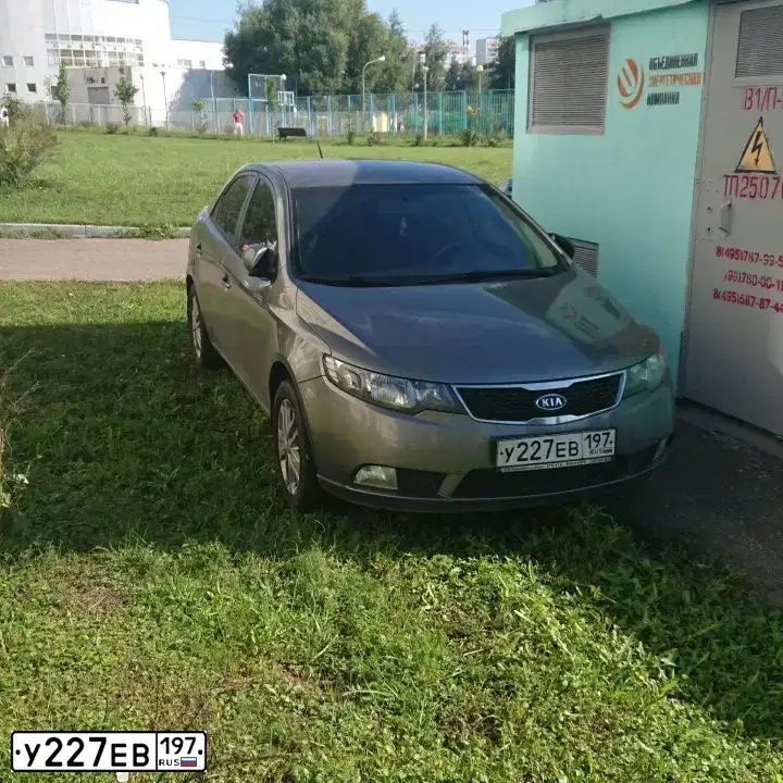 Фото автомобиля KIA CERATO, 2010 — госномер О917ОМ46. Цвет: Серый