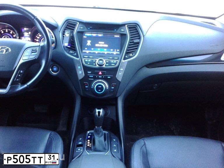 Фото автомобиля HYUNDAI SANTA FE, 2012 — госномер Х775УВ31. Цвет: ЧЕРНЫЙ
