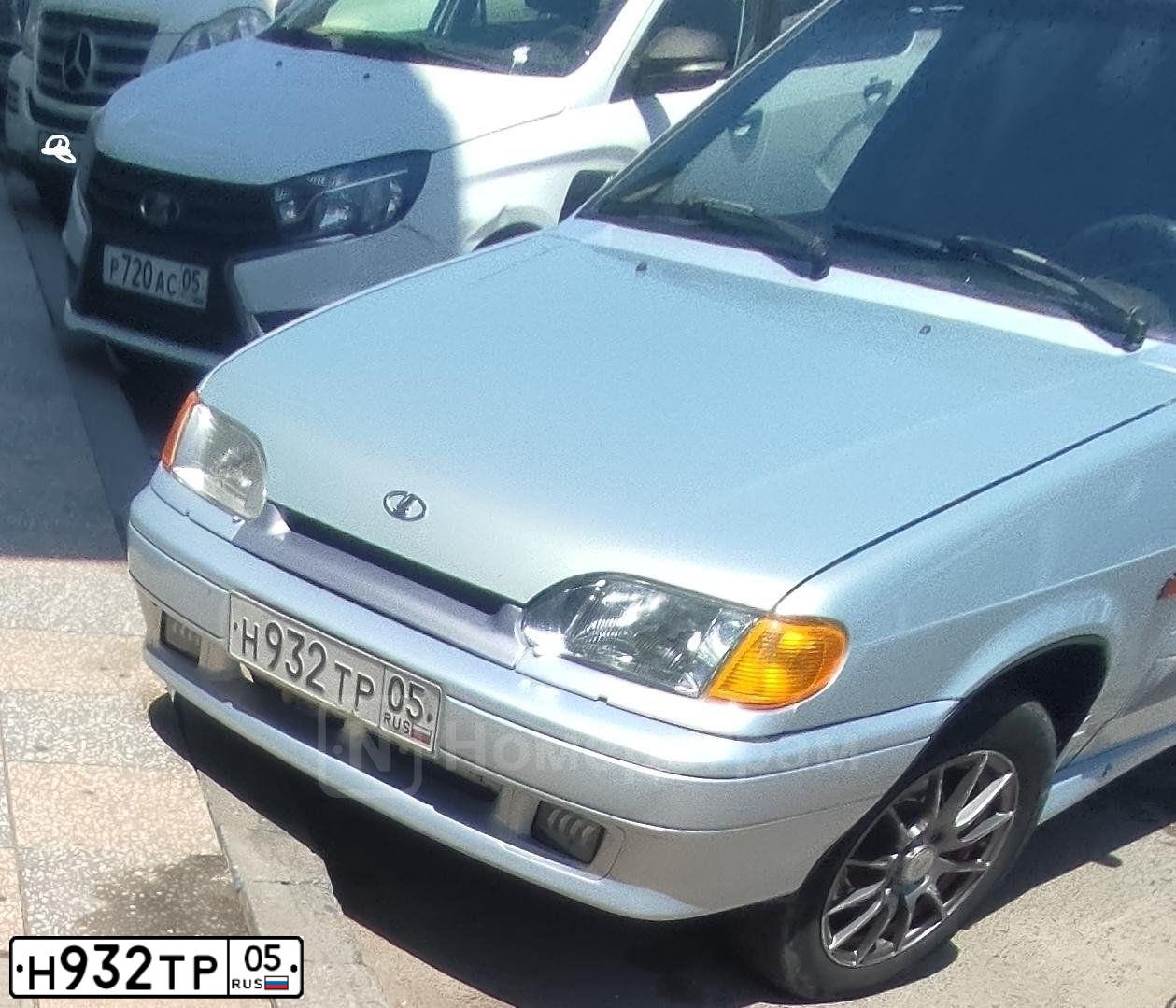 Фото автомобиля LADA 2114 SAMARA, 2005 — госномер Н932ТР05. Цвет: Серебристо-Желтый