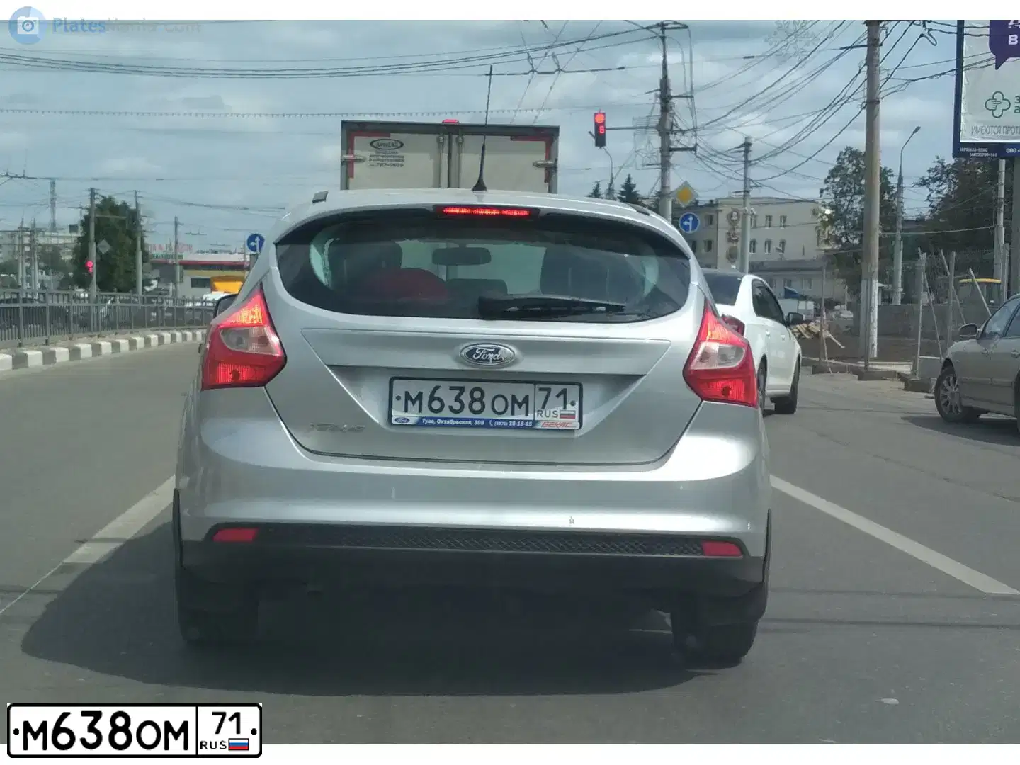 Фото автомобиля FORD FOCUS, 2011 — госномер М638ОМ71. Цвет: серебристый