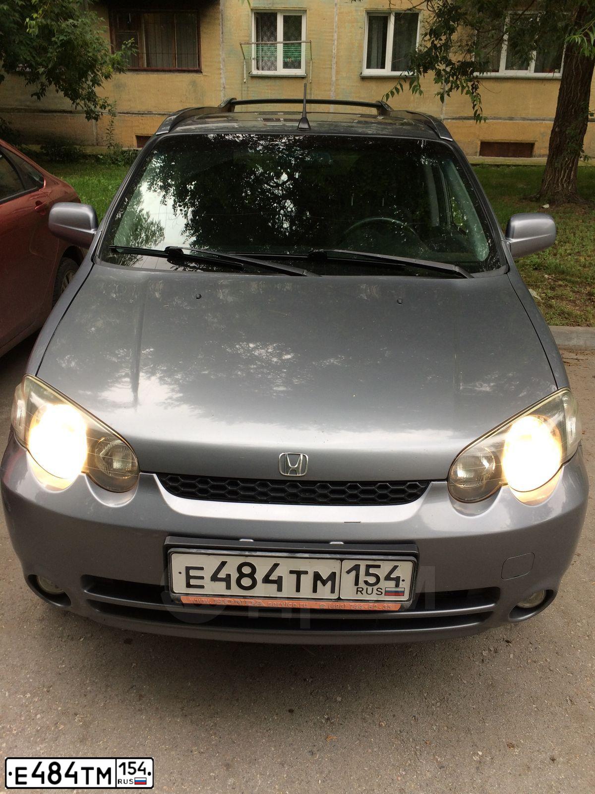 Фото автомобиля HONDA HR-V, 2001 — госномер Е484ТМ154. Цвет: Серый