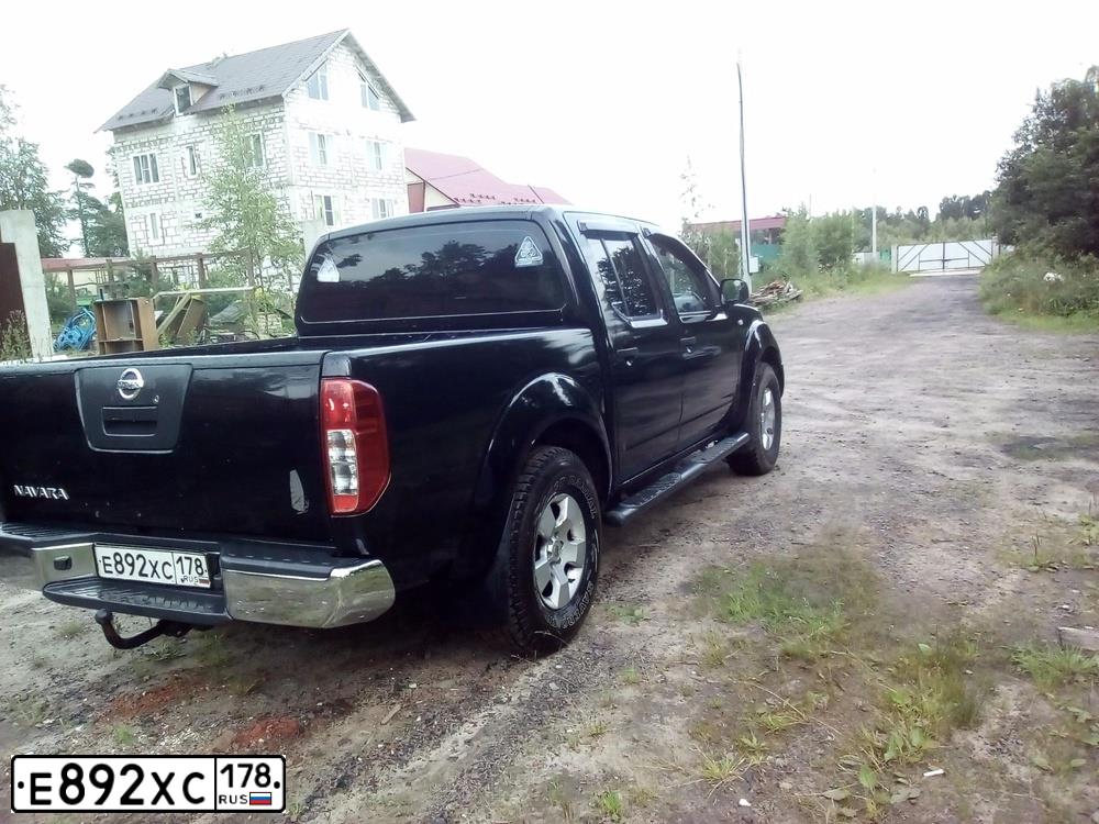 Фото автомобиля NISSAN NAVARA, 2007 — госномер Х767ВН98. Цвет: ЧЕРНЫЙ