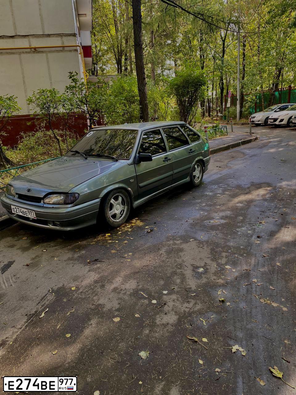Фото автомобиля LADA 2114 SAMARA, 2011 — госномер Е274ВЕ977. Цвет: средний серо-зеленый металлик