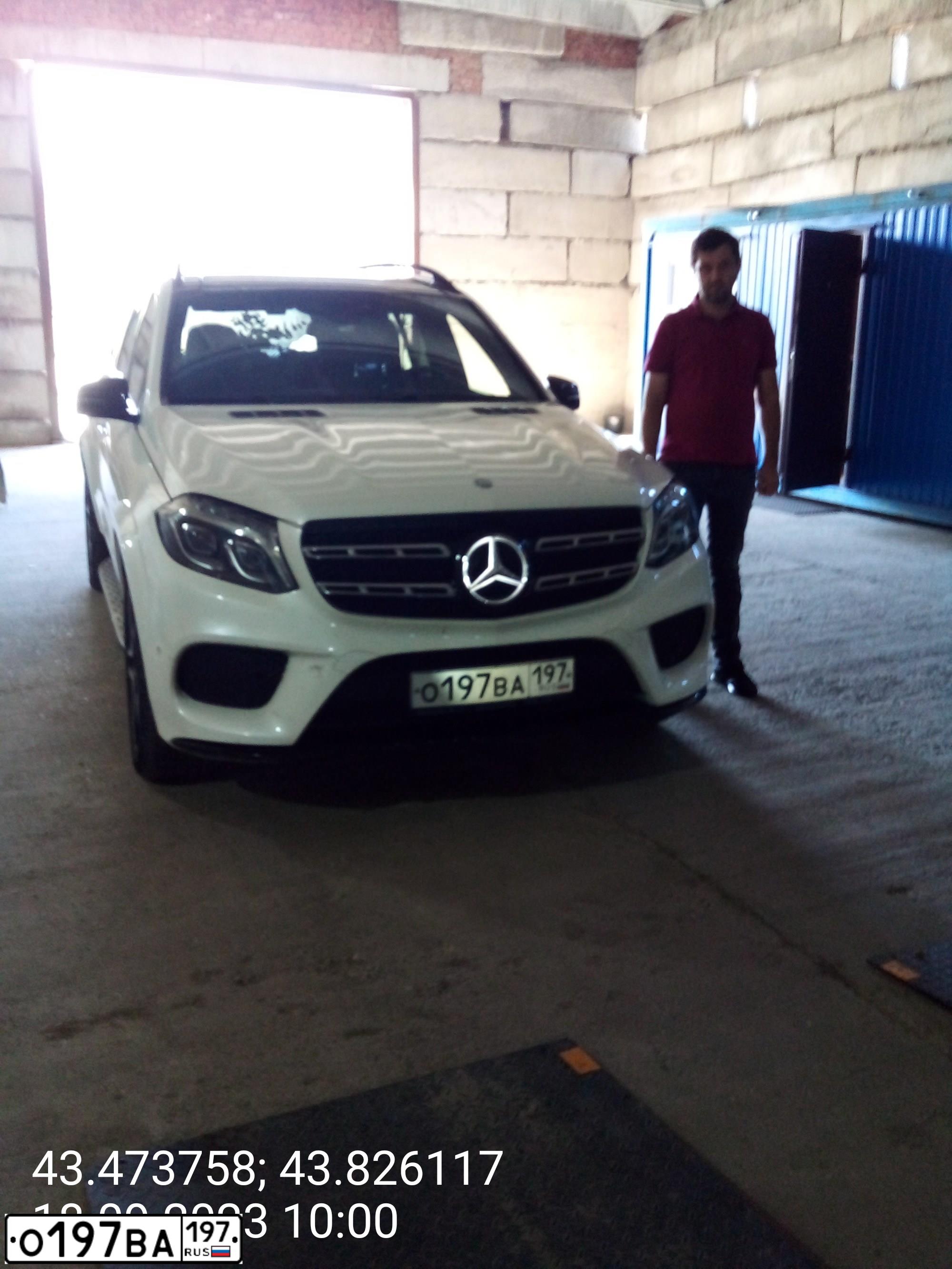 Фото автомобиля BMW X5, 2011 — госномер О957КО790. Цвет: Белый