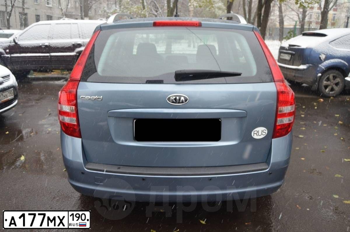 Фото автомобиля KIA SOUL, 2010 — госномер Е560СН750. Цвет: ЧЕРНЫЙ