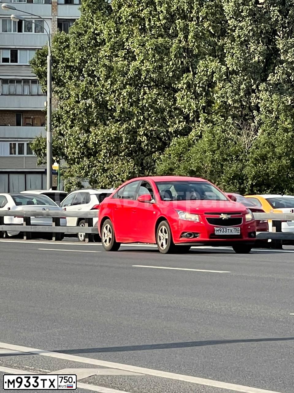 Фото автомобиля CHEVROLET CRUZE, 2011 — госномер Т254ЕТ193. Цвет: Красный