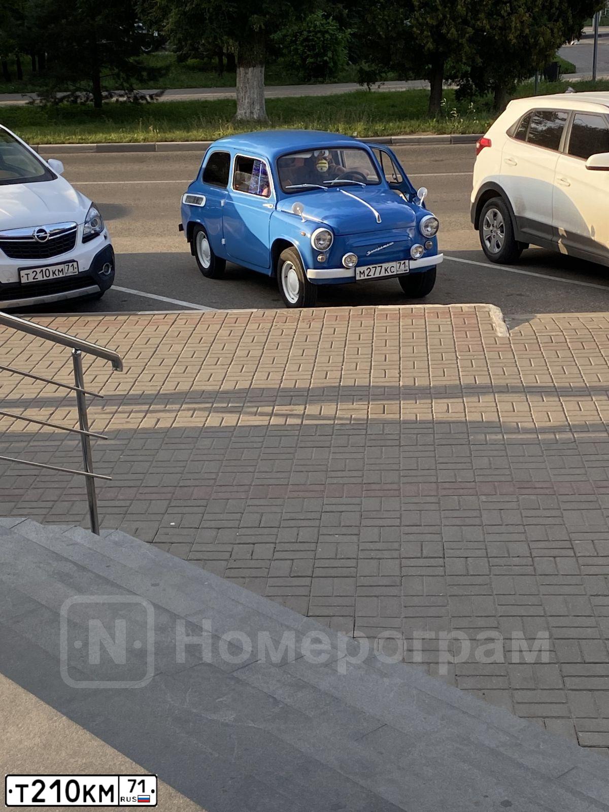 Фото автомобиля OPEL MOKKA, 2014 — госномер Т210КМ71. Цвет: БЕЛЫЙ