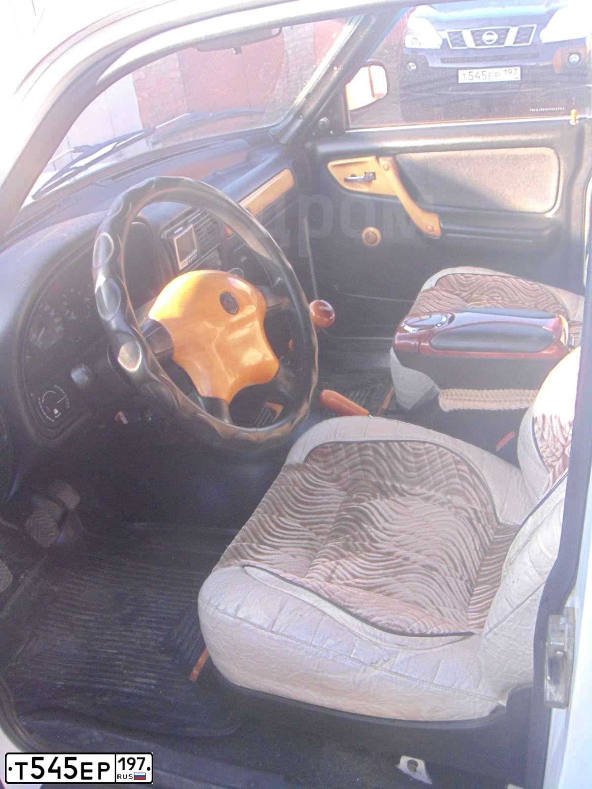 Фото автомобиля NISSAN X-TRAIL, 2010 — госномер Т545ЕР197. Цвет: ЧЕРНЫЙ