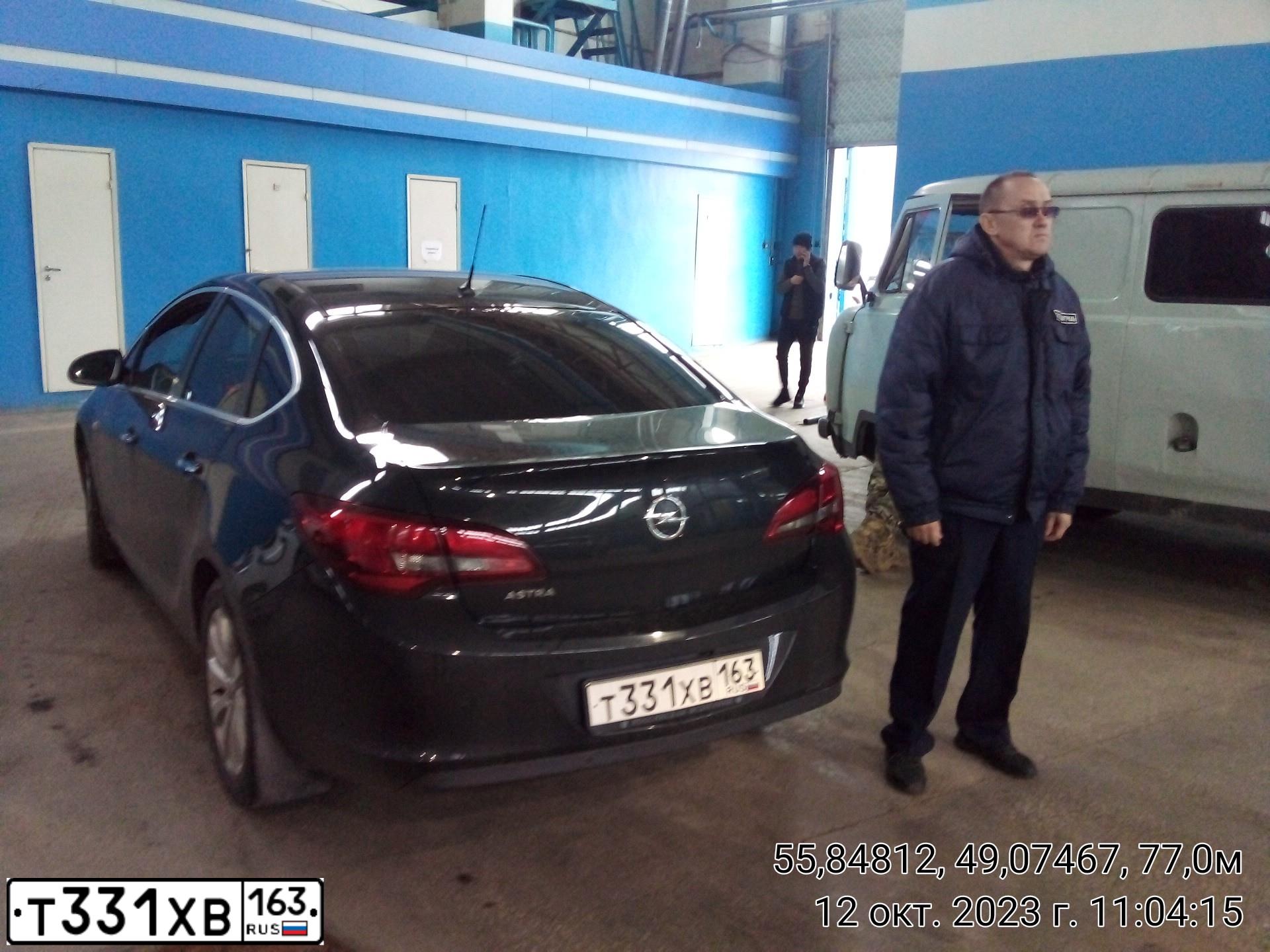 Фото автомобиля OPEL ASTRA, 2013 — госномер Е304НС164