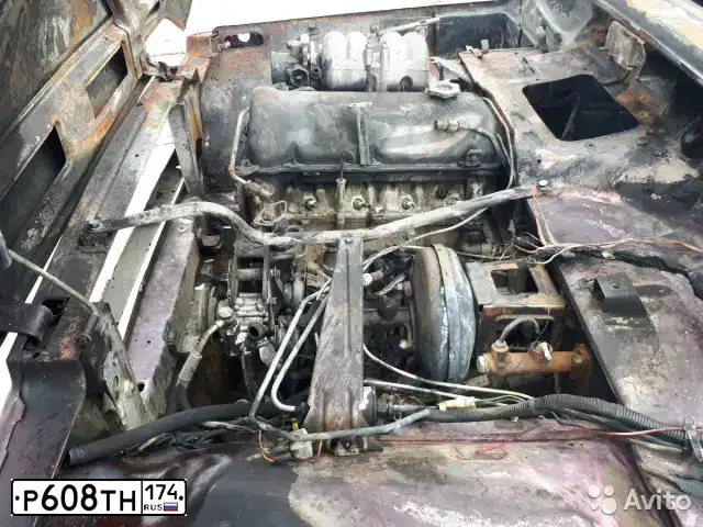 Фото автомобиля LADA 2121 NIVA, 2007 — госномер С002ХТ74. Цвет: ТЕМНО-ВИШНЕВЫЙ