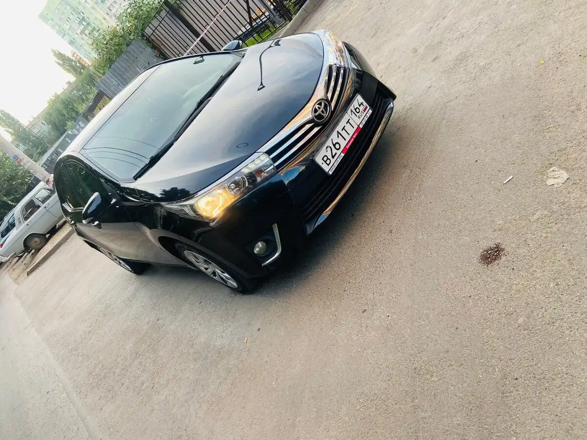 Фото автомобиля TOYOTA COROLLA, 2014 — госномер К595МК164. Цвет: ТЕМНО СЕРЫЙ