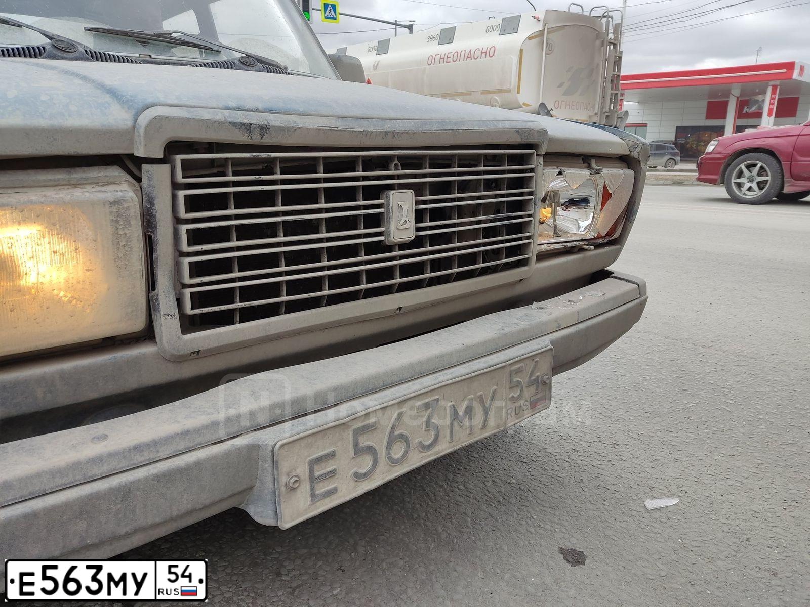 Фото автомобиля LADA 2107, 2008 — госномер Е563МУ54. Цвет: СИНЕ ЗЕЛЕНЫЙ