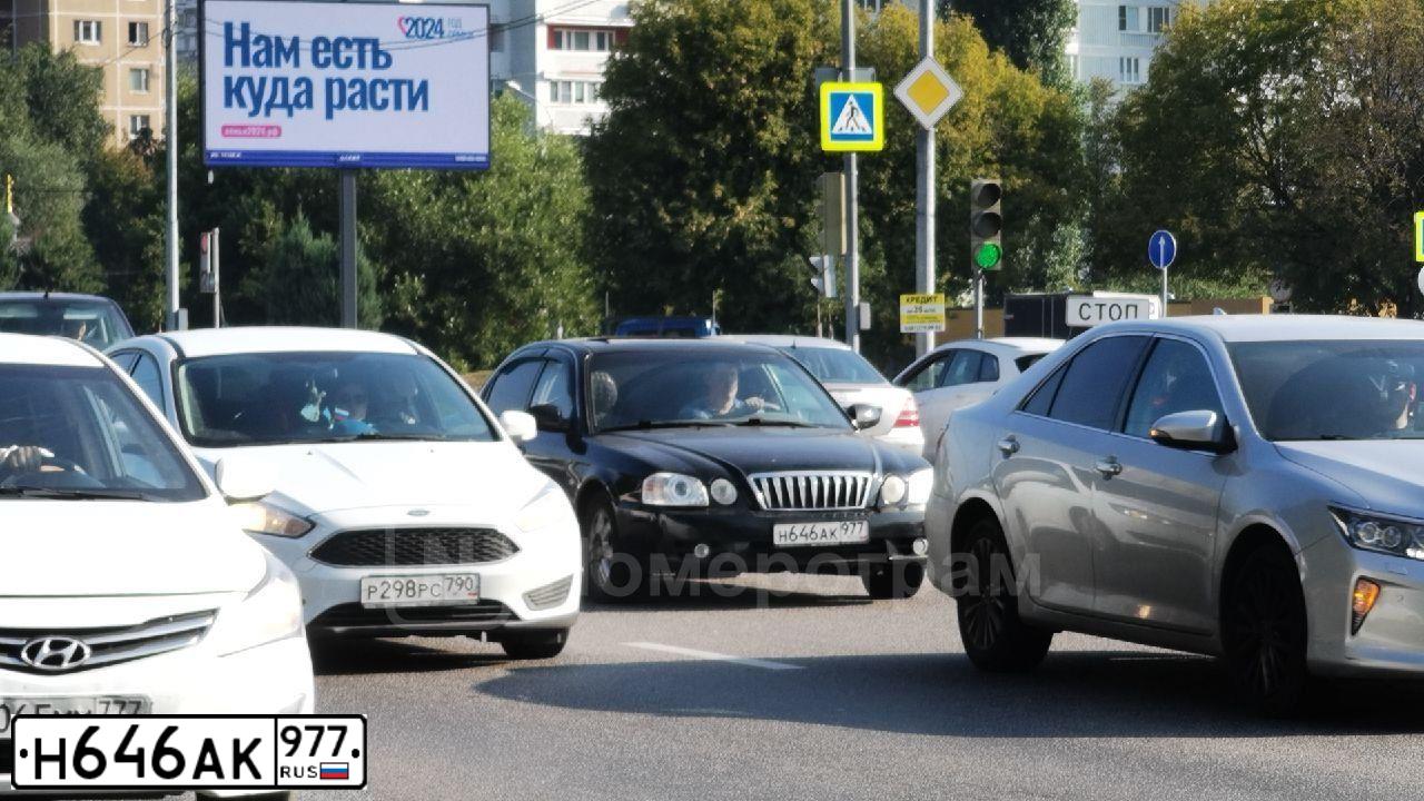 Фото автомобиля KIA MAGENTIS / OPTIMA, 2005 — госномер Н646АК977. Цвет: ЧЕРНЫЙ