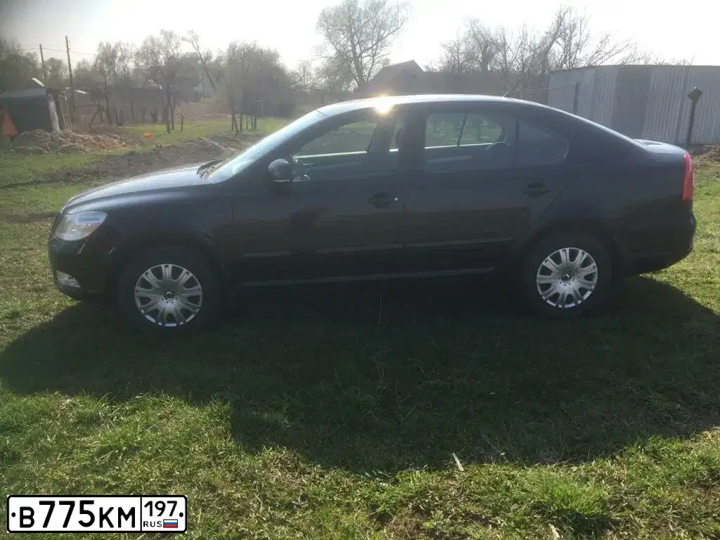 Фото автомобиля SKODA OCTAVIA, 2010 — госномер В775КМ197. Цвет: ЧЕРНЫЙ