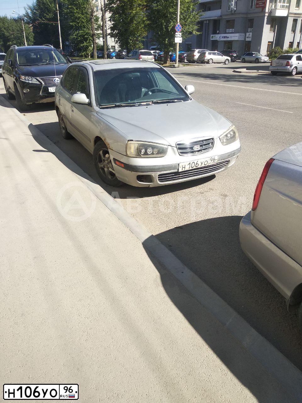 Фото автомобиля HYUNDAI ELANTRA, 2001 — госномер Н106УО96. Цвет: СВЕТЛО-СЕРЫЙ