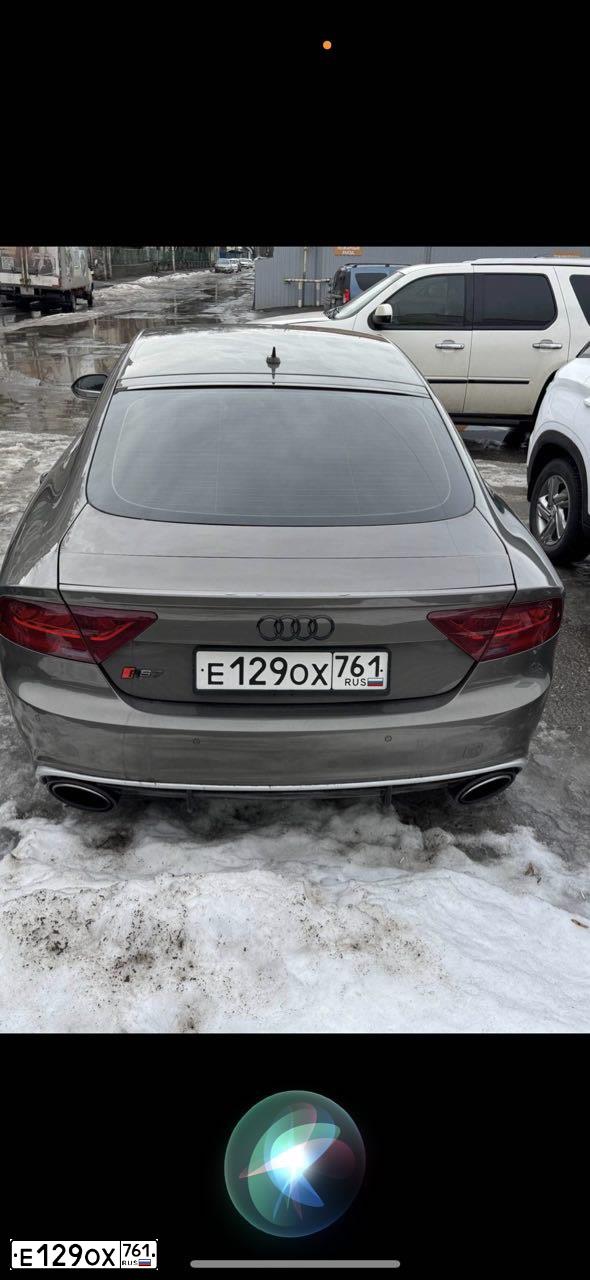 Фото автомобиля AUDI A7, 2010 — госномер Е129ОХ761. Цвет: СЕРО-КОРИЧНЕВЫЙ