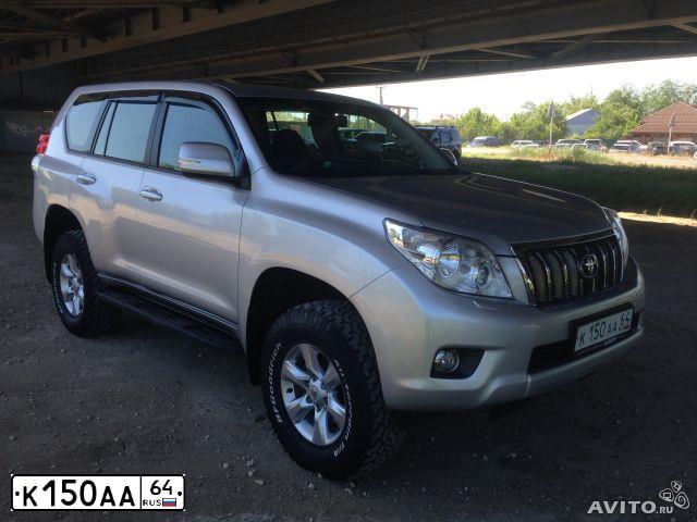 Фото автомобиля TOYOTA LANDCRUISER, 2014 — госномер К150АА64. Цвет: БЕЛЫЙ ПЕРЛАМУТР