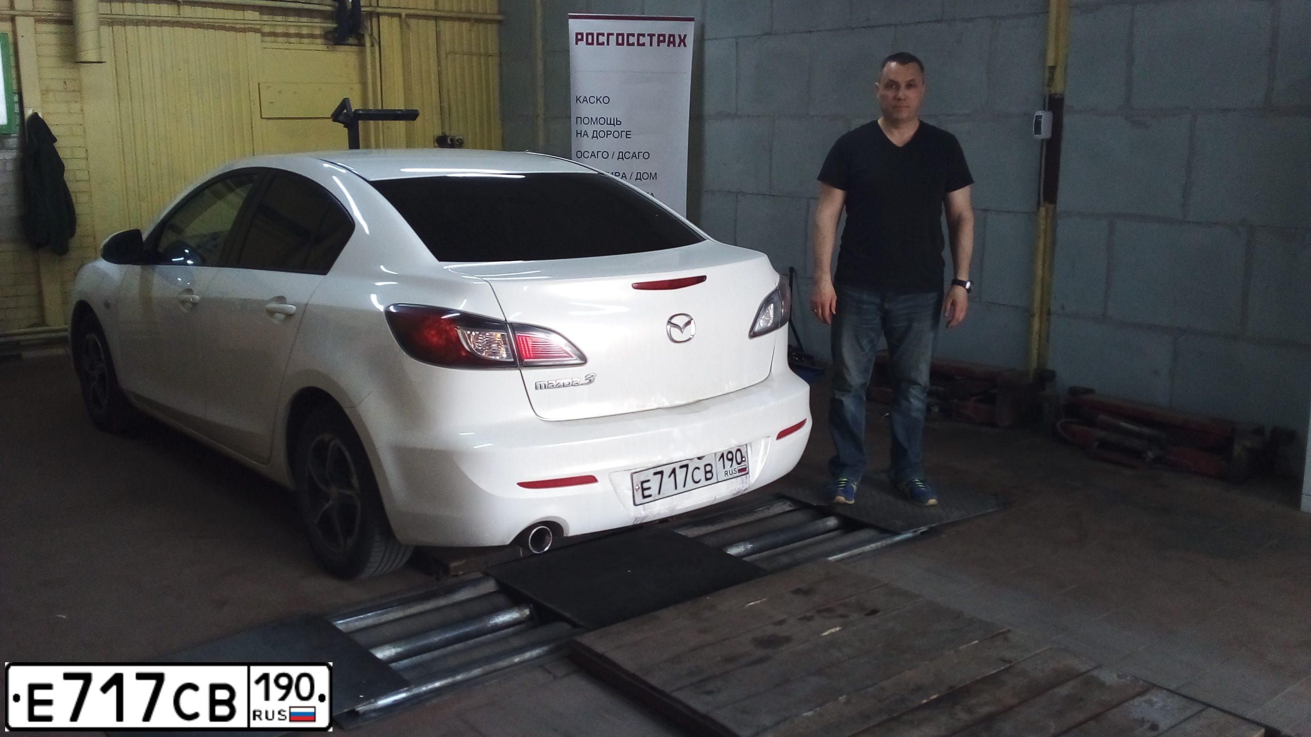 Фото автомобиля MAZDA 3, 2011 — госномер М990ОО799. Цвет: Белый