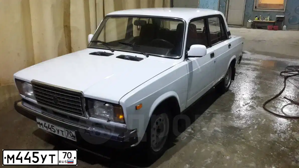 Фото автомобиля LADA 2107, 2003 — госномер Н317РУ70. Цвет: Белый