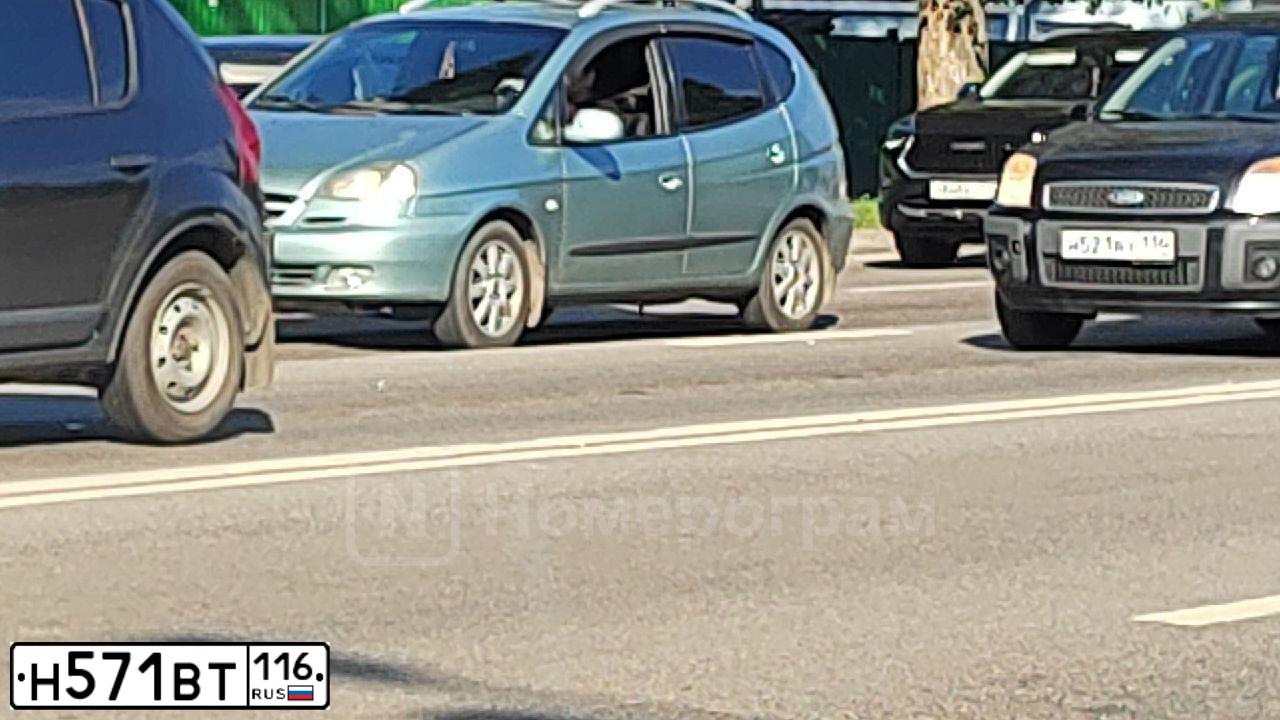 Фото автомобиля LADA 2114, 2010 — госномер М129УР21. Цвет: Сине-Черный