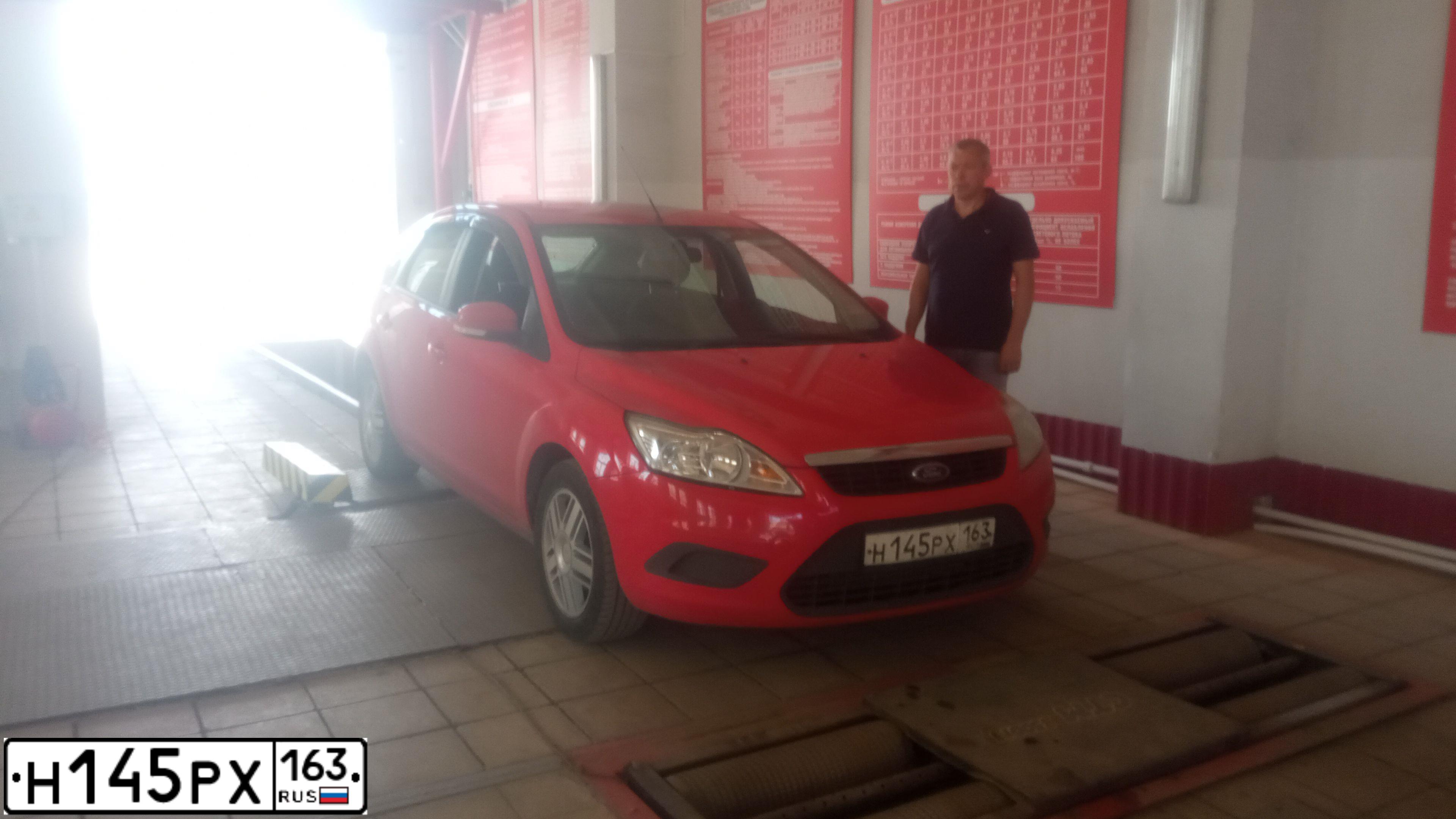 Фото автомобиля FORD FOCUS, 2010 — госномер Р731ТК73. Цвет: Красный