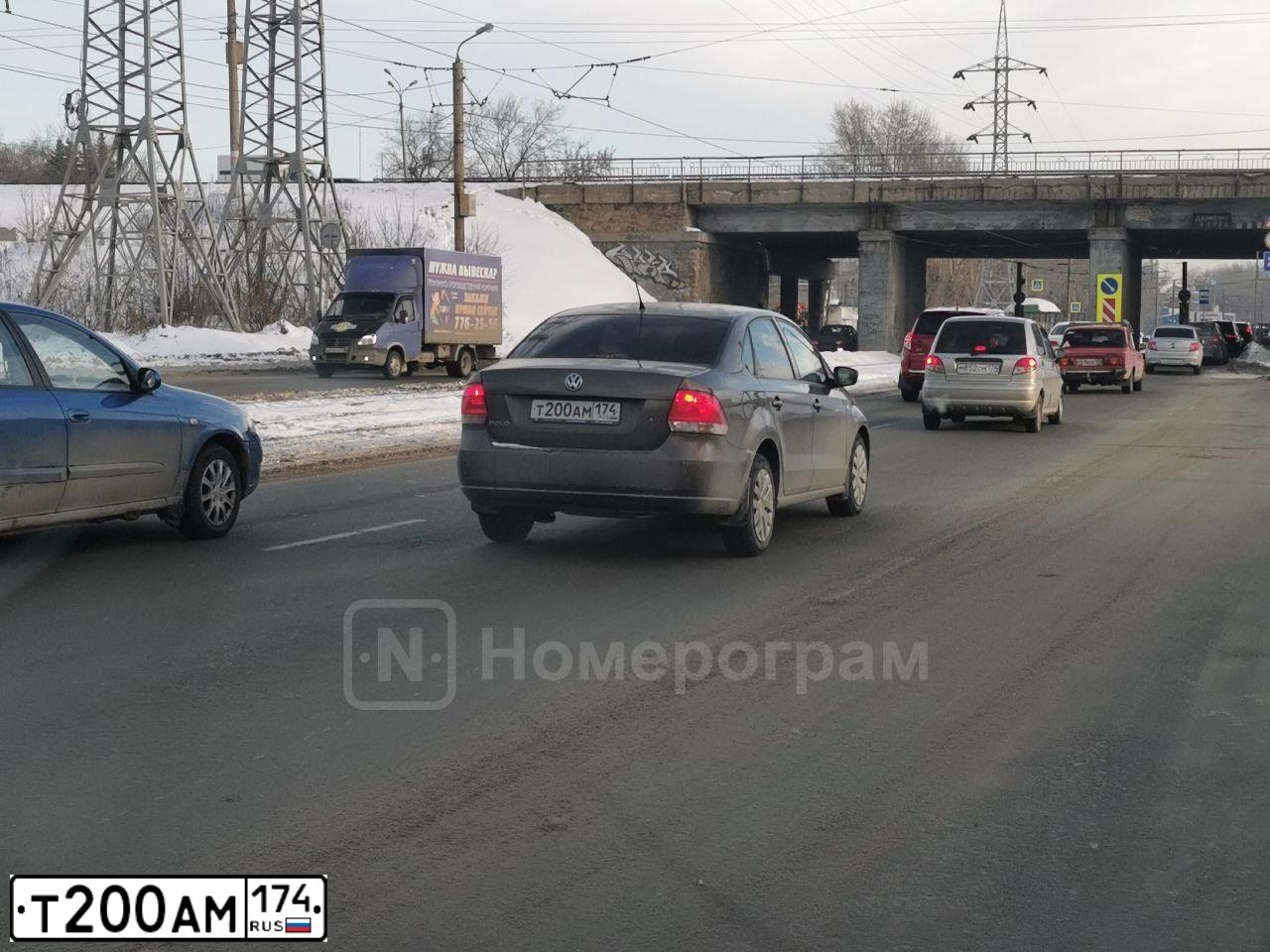 Фото автомобиля VOLKSWAGEN POLO, 2015 — госномер Т200АМ174. Цвет: КОРИЧНЕВЫЙ