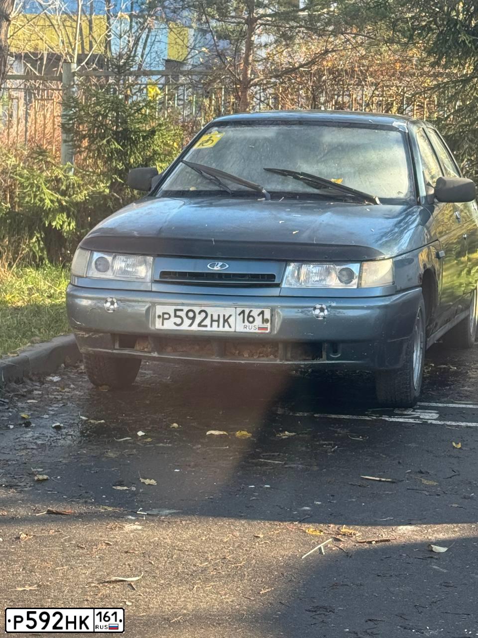 Фото автомобиля LADA 2112, 2001 — госномер Р592НК161. Цвет: Белый