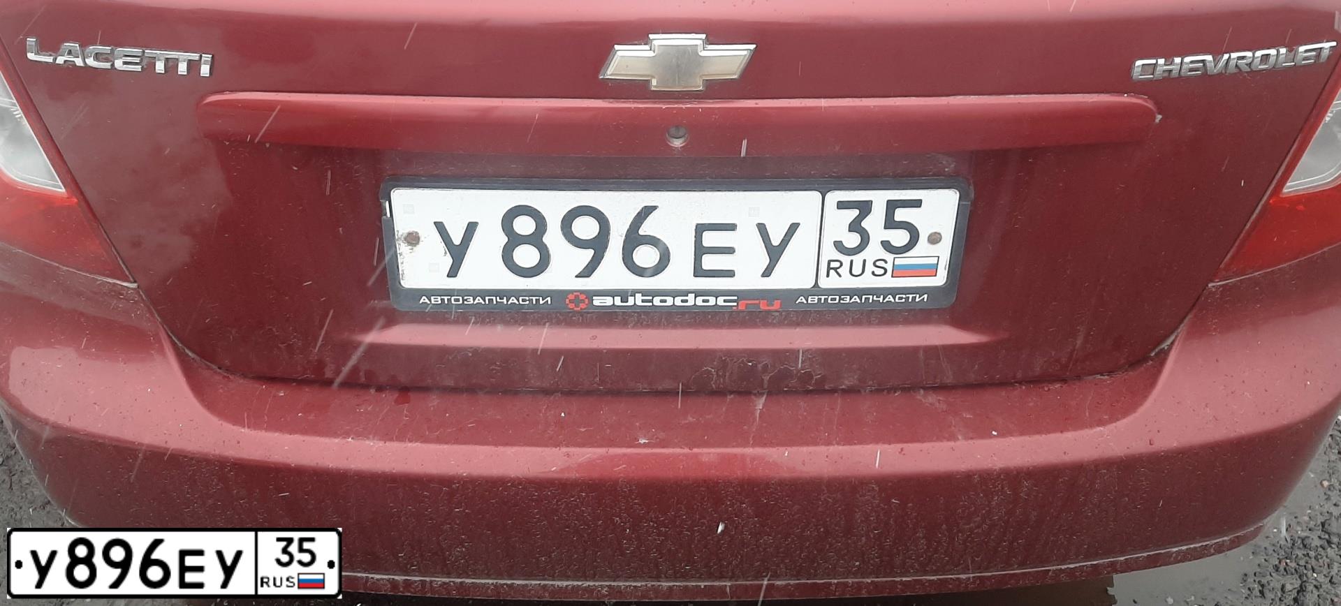 Фото автомобиля CHEVROLET LACETTI, 2008 — госномер М409КН35. Цвет: Красный