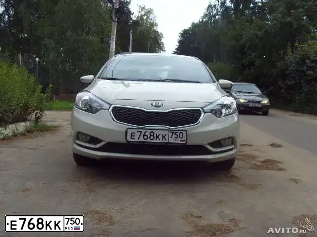 Фото автомобиля KIA CERATO, 2014 — госномер Е768КК750. Цвет: СЕРЫЙ СВЕТЛЫЙ