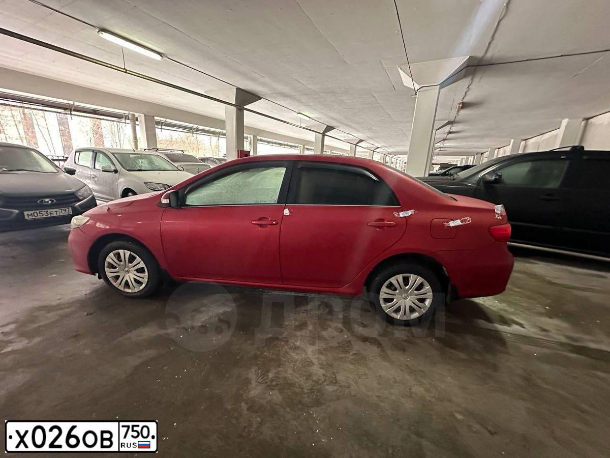 Фото автомобиля TOYOTA COROLLA, 2011 — госномер Х026ОВ750. Цвет: КРАСНЫЙ