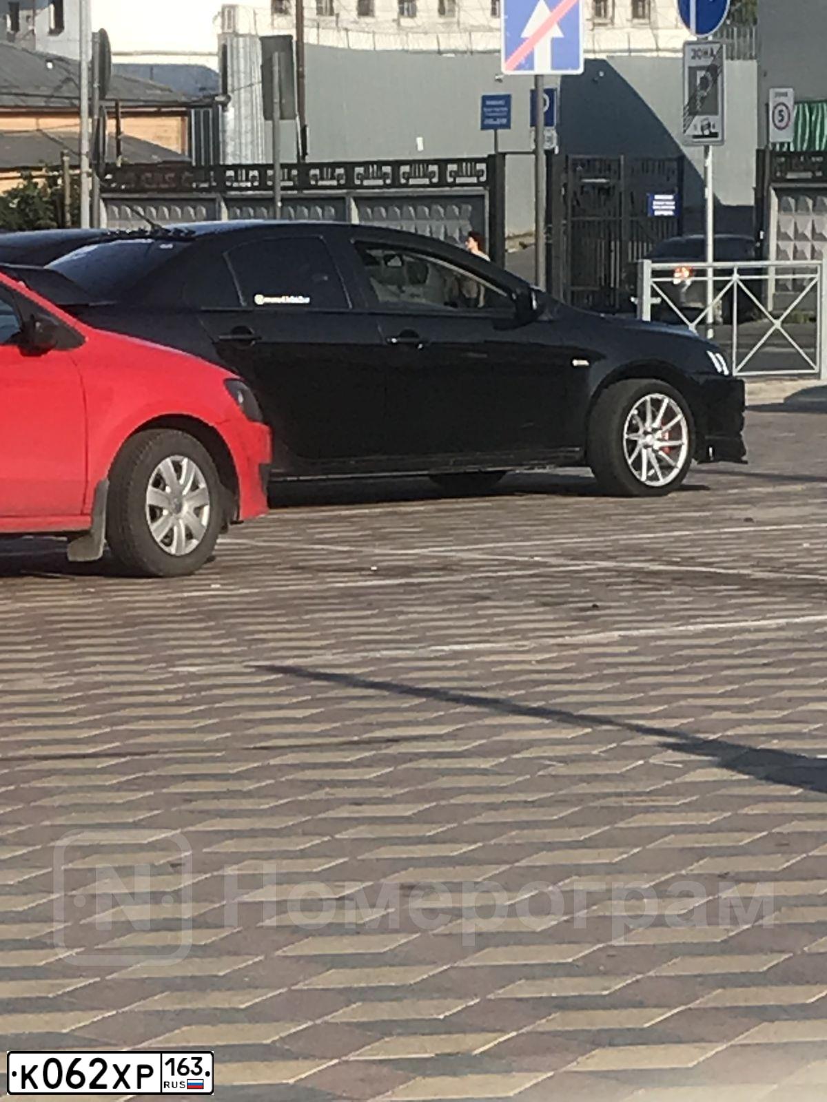 Фото автомобиля MITSUBISHI LANCER, 2008 — госномер К062ХР163. Цвет: ЧЕРНЫЙ