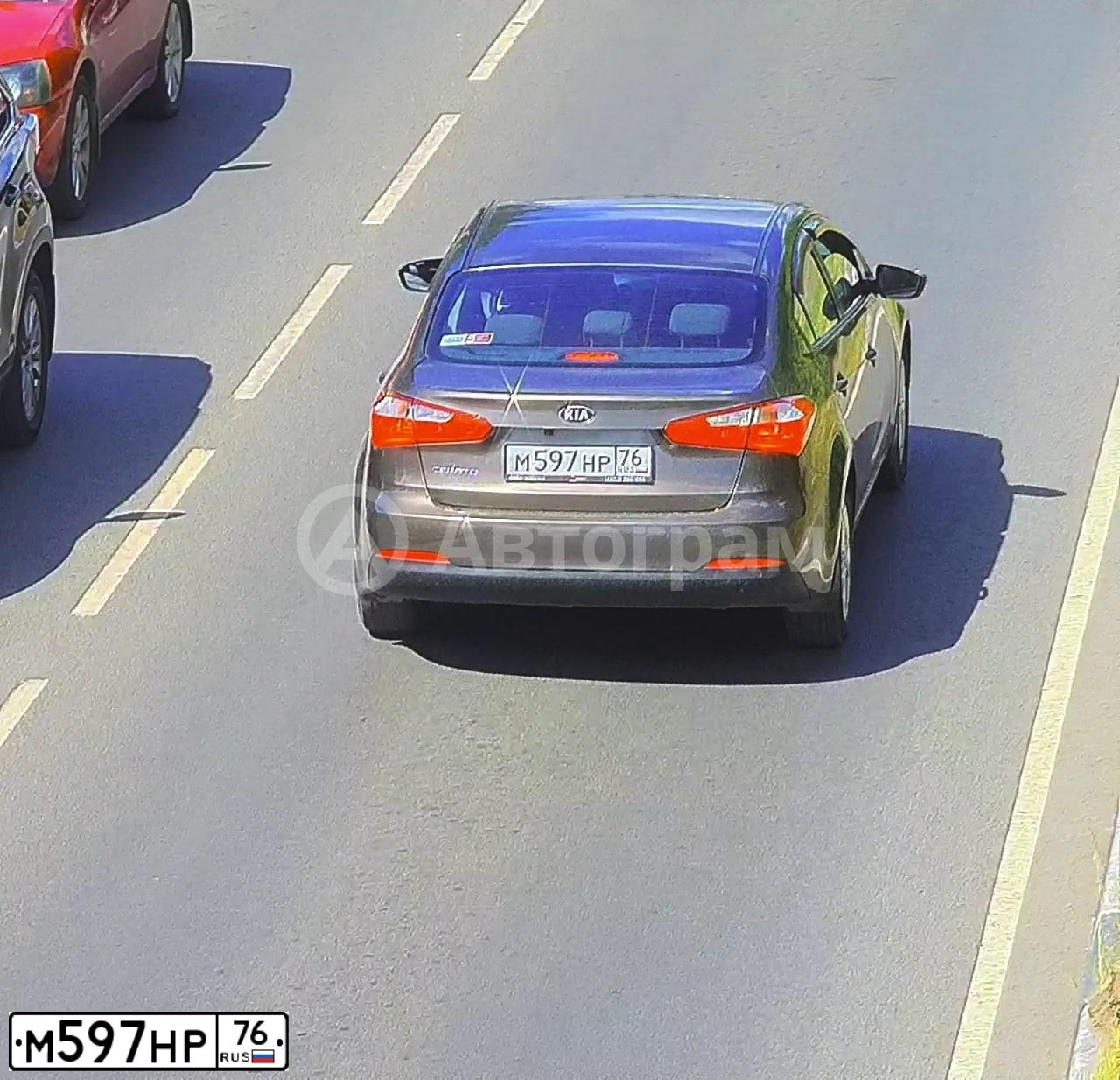 Фото автомобиля KIA CERATO, 2015 — госномер М597НР76. Цвет: КОРИЧНЕВЫЙ