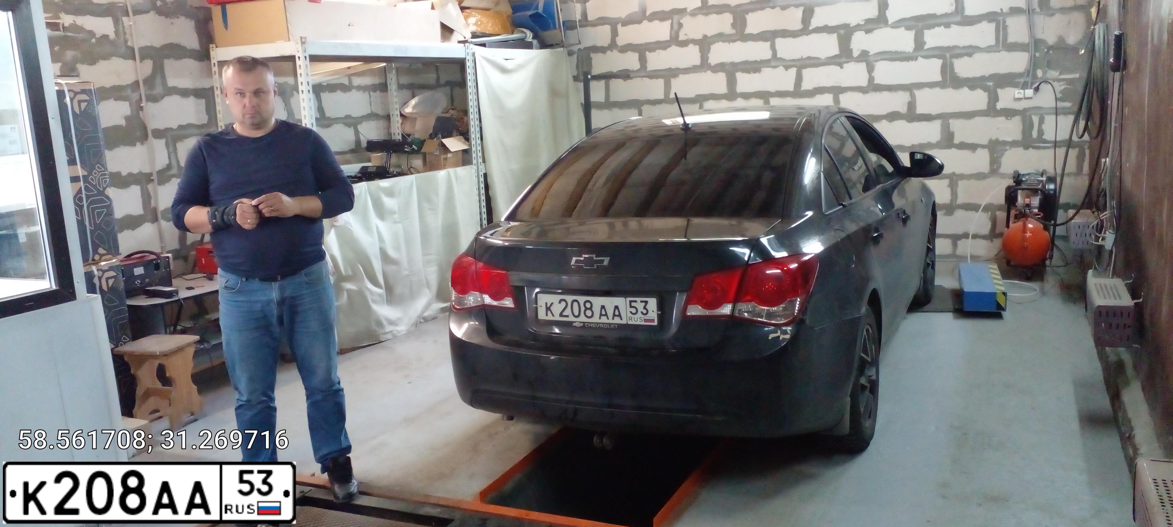 Фото автомобиля CHEVROLET CRUZE, 2010 — госномер С141ТТ53. Цвет: ЧЕРНЫЙ