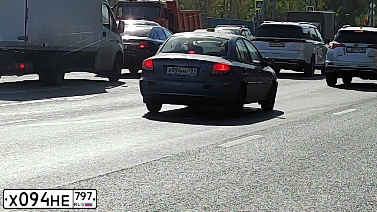 Фото автомобиля KIA RIO, 2004 — госномер Х094НЕ797. Цвет: ФИОЛЕТОВЫЙ