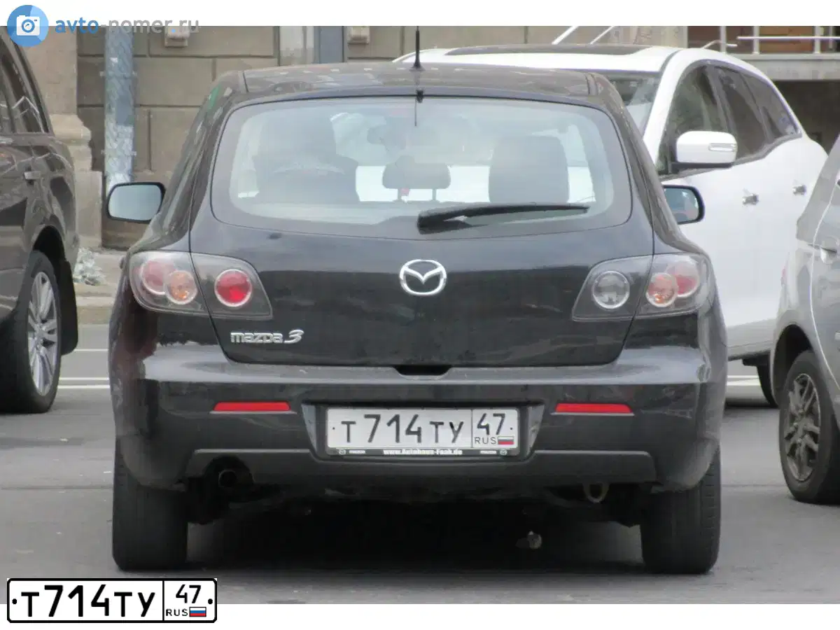 Фото автомобиля MAZDA 3, 2007 — госномер Т714ТУ47. Цвет: ЧЕРНЫЙ