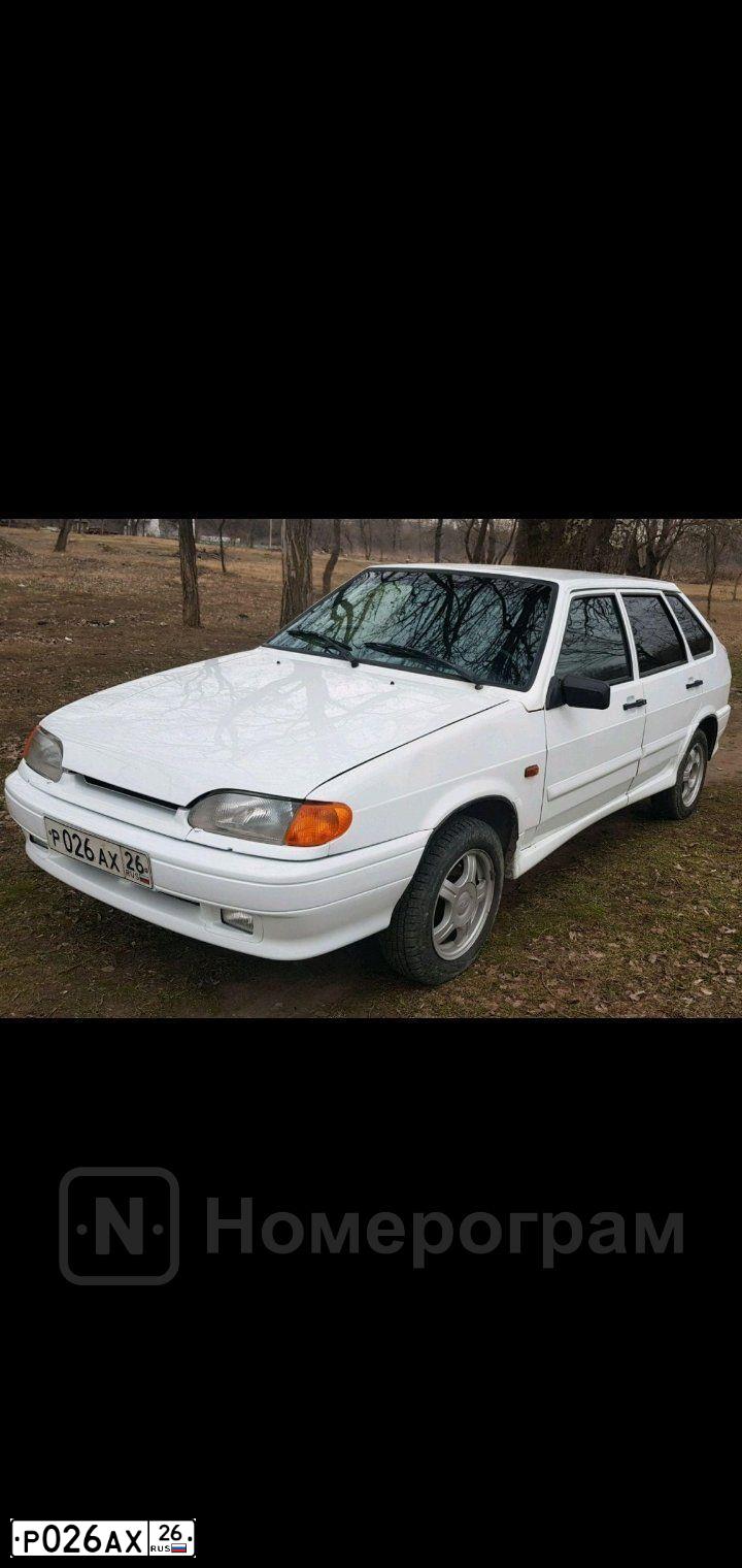 Фото автомобиля LADA 2112, 2007 — госномер К169ОК26. Цвет: СЕРО-СИНЕ-ЗЕЛЕНЫЙ