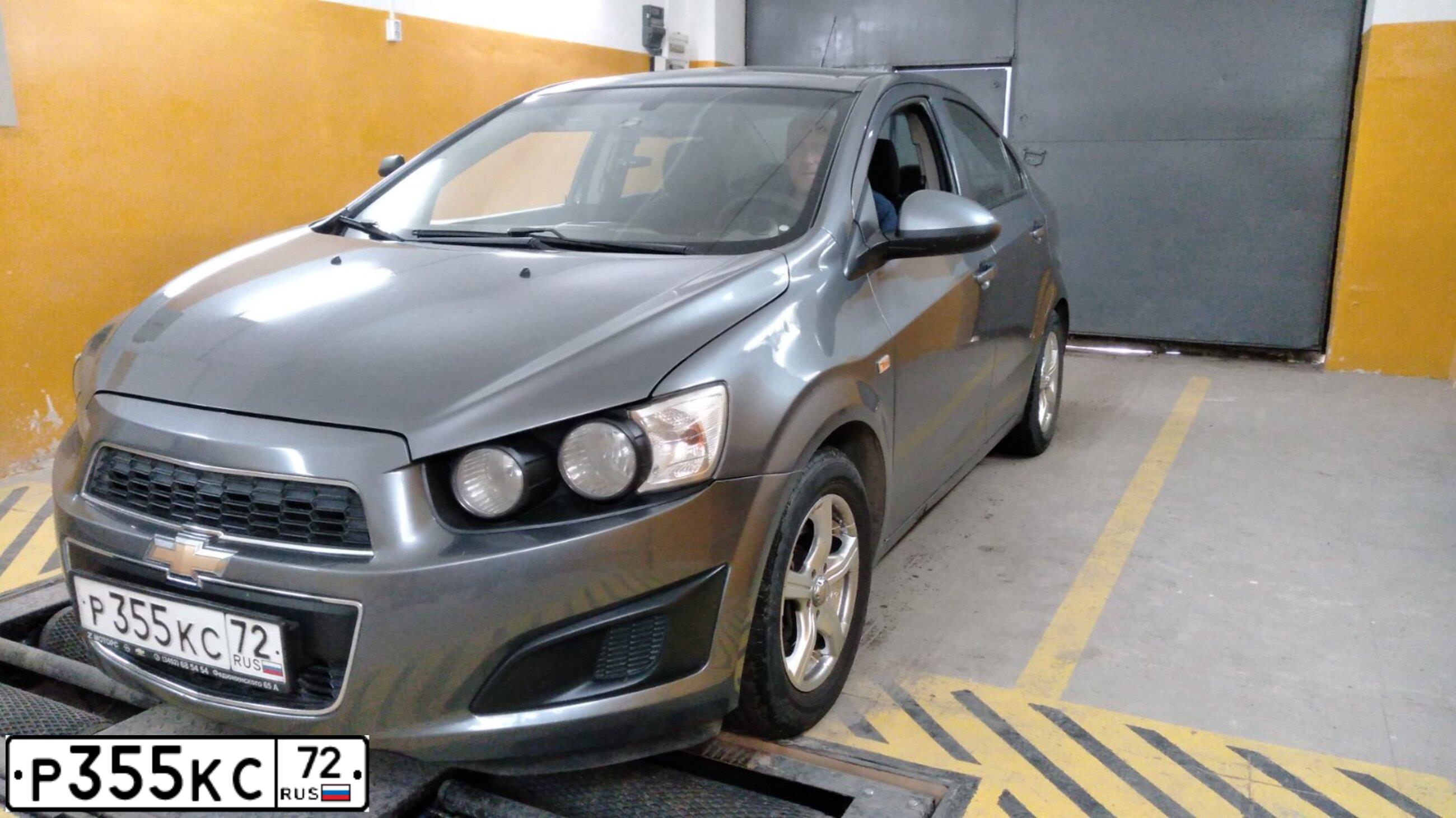 Фото автомобиля CHEVROLET T AVEO, 2013 — госномер Р355КС72. Цвет: СЕРЫЙ МЕТАЛЛИК